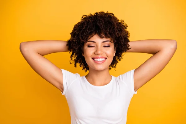 Close-up portrait of her she nice cute fascinating attractive charming cheerful cheery dreamy wavy-haired girl enjoying day daydream relaxation isolated on bright vivid shine yellow background — Stock Photo, Image