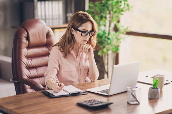 Close up photo beautiful she his business lady best boss got promotion working day night first startup get some errors moments write down sit big office chair wearing specs formal wear shirt — Stockfoto