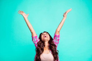 Portrait of her she nice cool attractive cheerful cheery optimistic wavy-haired lady wearing checked shirt lottery winner great best luck isolated over teal turquoise bright vivid shine background clipart