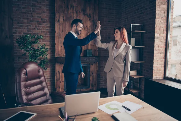 Close up photo beautiful she her her business lady he he he his guy glad income finance earnings satisfied stand clapping arms great beginning finish rich people sit office chair wearing formal wear suit —  Fotos de Stock