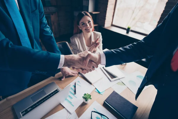 Cropped close-up view of nice classy elegant stylish trendy cheerful sharks shaking hands career promotion department development in loft industrial interior work place station — Stock Photo, Image