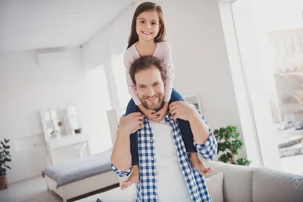 Portrait of his he her she nice cute lovely adorable attractive pre-teen cheerful cheery positive girl handsome bearded daddy  having fun in light white interior room indoors — Stock Photo, Image