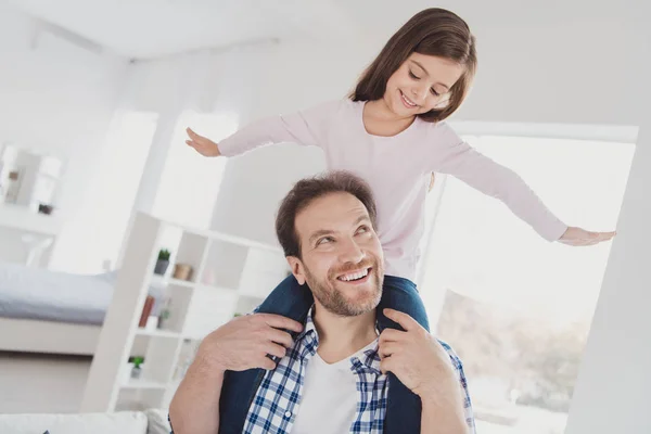 Portrait of his he her she nice cute lovely attractive pre-teen cheerful cheery positive funny careless girl handsome bearded dad daddy having fun daydream in light white interior room indoors — Stock Photo, Image