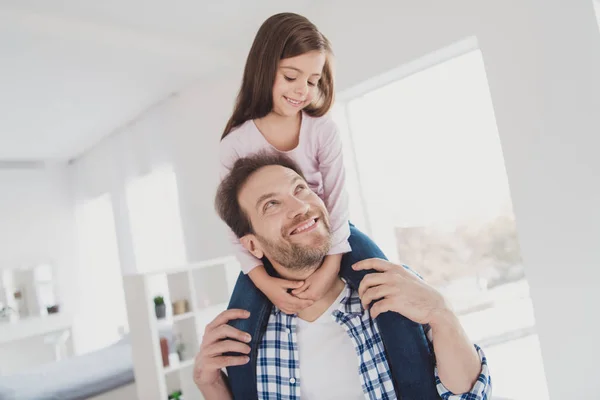 Portrait of his he her she nice cute lovely sweet adorable attractive pre-teen cheerful cheery positive girl handsome bearded dad daddy having fun holding in light white interior room indoors — Stock Photo, Image