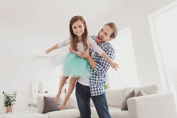 Close up photo two little she her lady girl handsome beard bristle he him his father guy hold hands like airplane flying homey indoors glad togetherness lovely great morning sunday light flat house — Stock Photo, Image