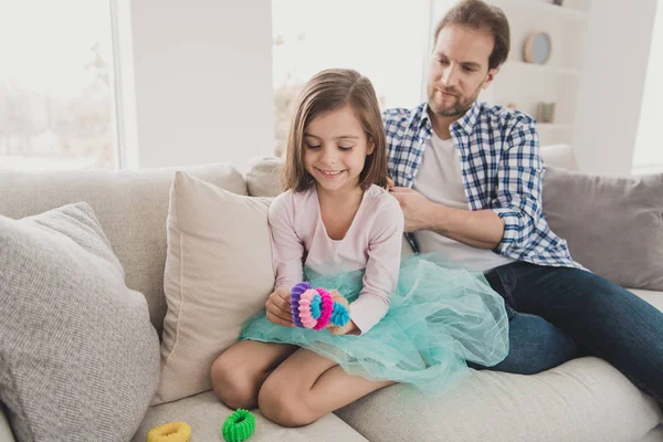 Close up photo little she her girl handsome he him his guy father conversation hair making pigtails ponytails braids morning sunday wear jeans denim checkered plaid shirt light house sit cozy divan — Stock Photo, Image