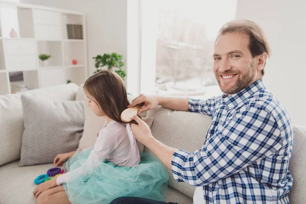 Close up side profile photo little she her girl happy he him his father hair make pigtails ponytails braids morning before kindergarten wear jeans denim checkered plaid shirt house sit cozy divan — Fotografia de Stock