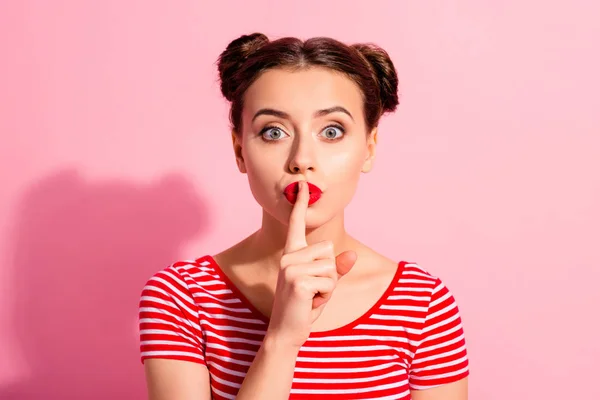 Close up photo beautiful she her lady pretty buns bright pomade lipstick arm hand finger lips asking not talk tell speak fellow friend wear casual striped red white t-shirt isolated pink background — Stock Photo, Image