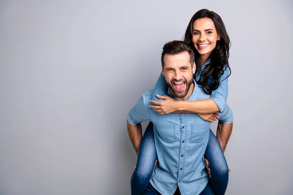 Close up photo funky amazing cheer she her he him his couple lady guy best friends piggyback ride buddies ready party wear casual jeans denim shirts outfit clothes isolated light grey background — Stock Photo, Image
