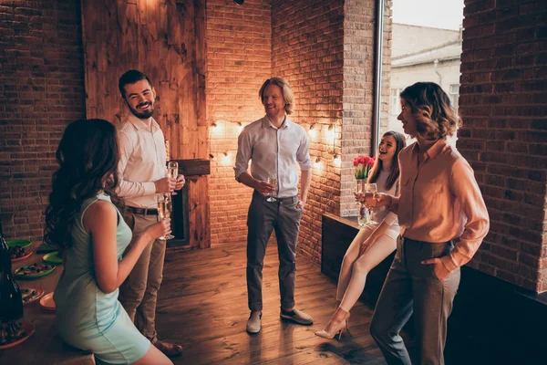 Company of nice elegant classy attractive cheerful positive guys ladies having fun talk 8 March day romantic atmosphere casual formal-wear in industrial loft interior room indoors — Stock Photo, Image