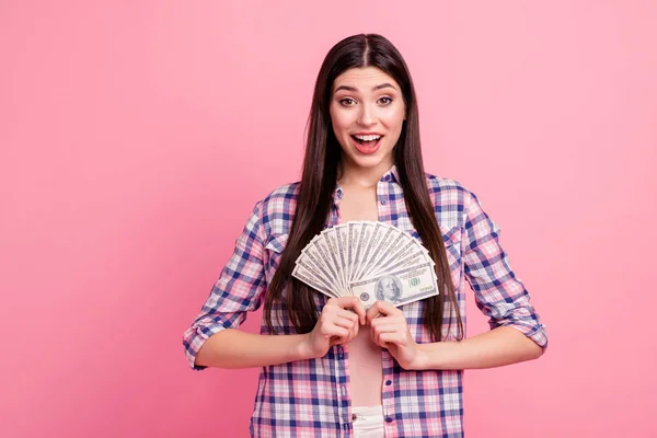 Portrait of her she nice-looking attractive cute charming shine lovely cheerful straight-haired lady holding in hands cash shopaholic big sale day isolated over pink pastel background — Stock Photo, Image