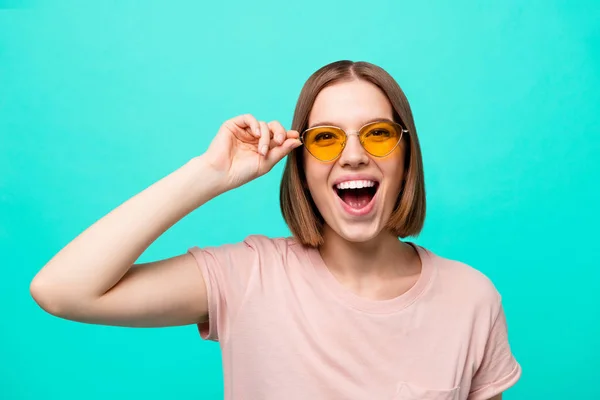 Close up photo beautiful her she lady modern fashionable look short straight hair show white teeth yell scream shout loud wear specs casual t-shirt isolated teal turquoise background — Stock Photo, Image