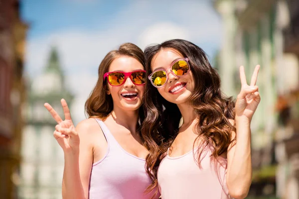 Close up photo charming cute trendy pretty hairstyle best millennial travel  trip long hair spring pastel clothing modern spec travel enjoy free time laugh make v-signs satisfied joy town center — Stock Photo, Image