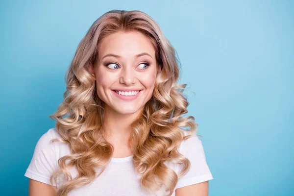 Close up photo friendly amazing beautiful her she lady look side empty space sly silly dimples cheeks cheekbones wear casual white t-shirt jeans denim clothes outfit isolated bright blue background — Stock Photo, Image