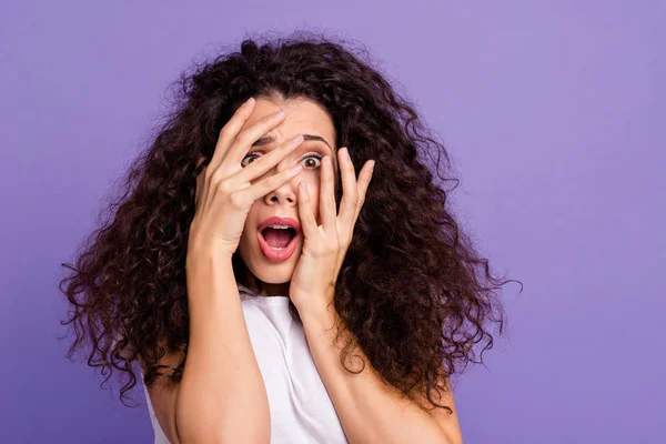 Close up photo beautiful her she lady unexpected arms hands fingers hide face eyes full fear opened mouth oh no expression wear casual white t-shirt clothes outfit isolated violet purple background — Stock Photo, Image