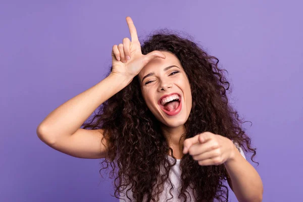 Close up photo beautiful her she lady index finger point you hand show loser symbol on forehead laugh out loud impolite wear casual white t-shirt clothes outfit isolated violet purple background — Foto de Stock