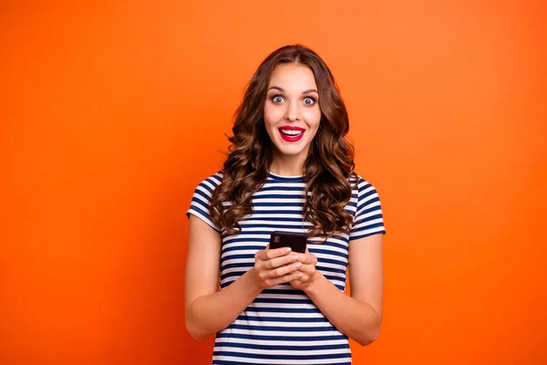 App blog influencer browse smm social media network concept. Closeup photo portrait of funny funky pretty with white toothy beaming smile she her lady holding gadget in hand isolated background
