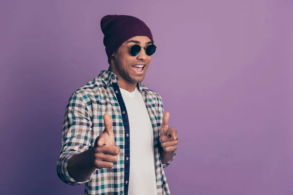 Close up photo amazing funky he he he he his macho stylish look hands arms index fingers direct I pick you sign wear casual specs plum color hat checkered plaid shirt isolated purple violet background — Foto de Stock