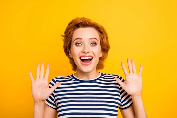 Close up photo beautiful amazing she her her lady hands arms raised high-five sign symbol bye hi hey say wearing casual striped white blue t-shirt outfit clothes isolated yellow bright background — Foto de Stock