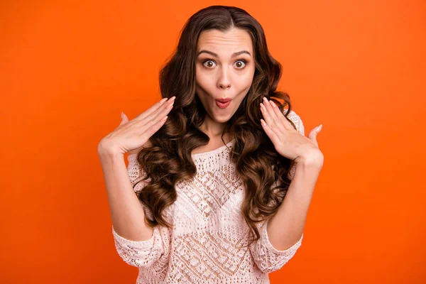 Portrait of her she nice adorable winsome charming lovely charming cheerful cheery funny shy wavy-haired lady isolated over bright vivid shine orange background — Stok Foto