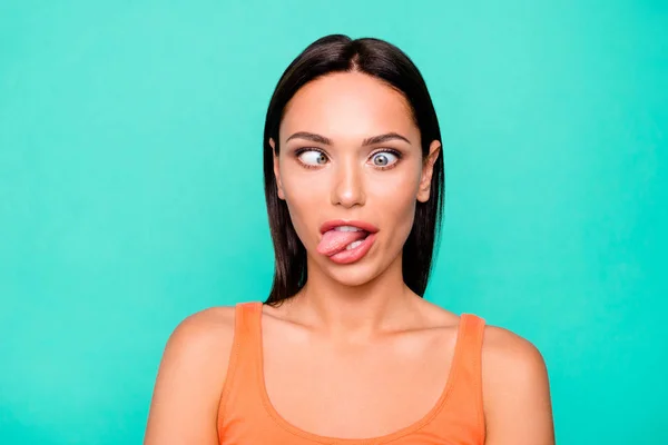 Close up photo portrait of funny funky playing fool making faces she her girl sticking tongue out watching in different ways isolated pastel background — Stock Photo, Image