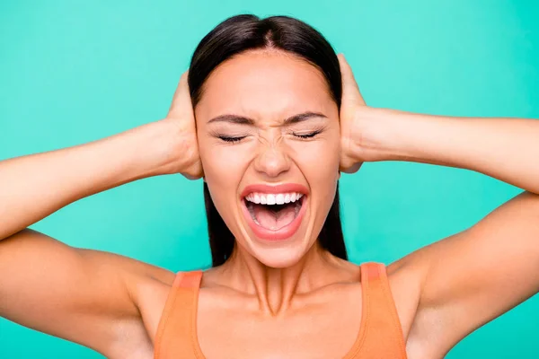 Closeup photo portrait of crazy mad nervous unhappy she her lady covering closing ears with palm isolated pastel background — Stock Photo, Image