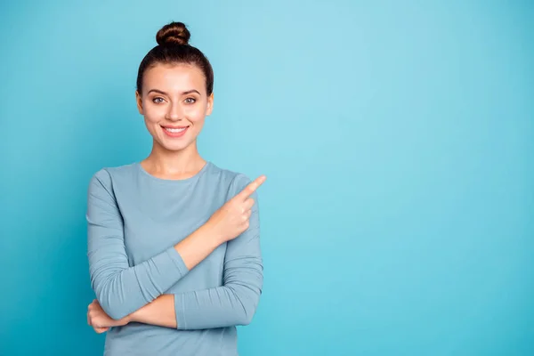 Close up photo beautiful amazing cute she her lady arm hand finger indicate empty space toothy advising buy buyer best low little price wear casual sweater pullover isolated blue bright background — Stock Photo, Image