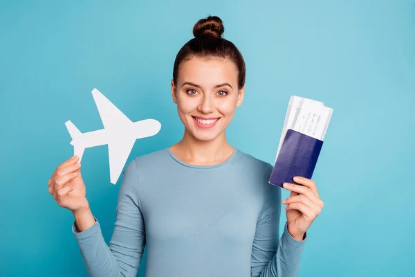 Close up photo beautiful amazing she her lady hands arms hold paper airplane go abroad parents first time show transport passport tickets wear casual sweater pullover isolated blue bright background — Stock Photo, Image