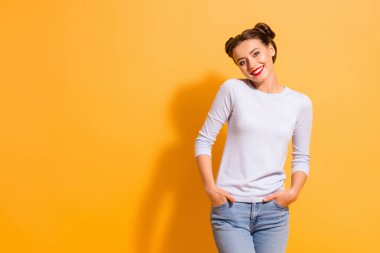 Portarit of cute nice magnificent young lady hangout with her best friends placing hands in pockets wearing white sweater denim trousers isolated over vibrant backgorund clipart