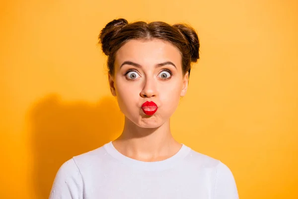 Close up portrait of nice young lady fooling around blowing her cheeks pouting her lips having fun on weekends holidays isolated over vibrant background in white clothing — Stock Photo, Image