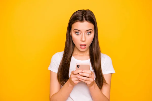 Close-up portrait of her she nice cute charming lovely sweet attractive amazed straight-haired girl browsing smm post news isolated over bright vivid shine background — Stock Photo, Image