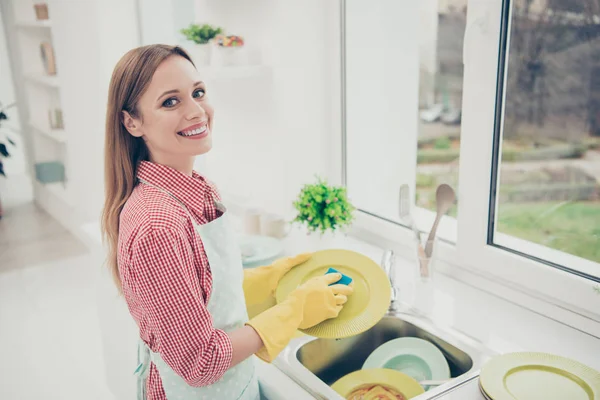 Close up side profile photo beautiful excited she her lady cleaner bright kitchen hold dirty plate spring cleanup prepare meeting holiday gathering wear casual jeans denim shirt avental flat inside — Fotografia de Stock