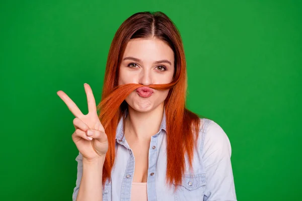 Close up photo beautiful she her foxy lady making false moustache curl pretend man guy male he he he he he his showing v-sign say hi hello wear casual jeans denim shirt isolated green bright background —  Fotos de Stock