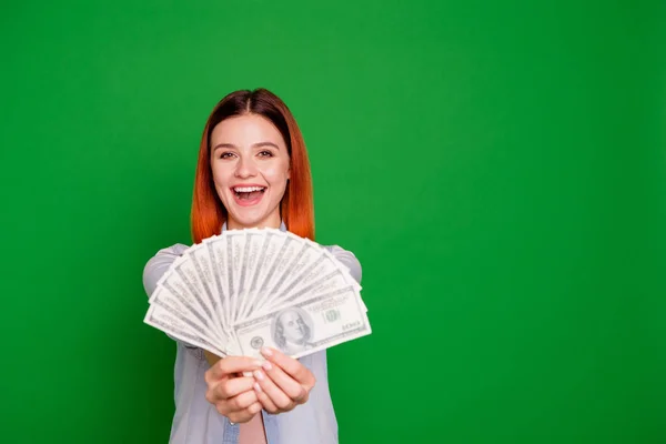 Portrait of funny charming youngster people get lottery luck lucky feel content candid long-haired beautiful stylish wear jeans clothes isolated on green background — Stock Photo, Image