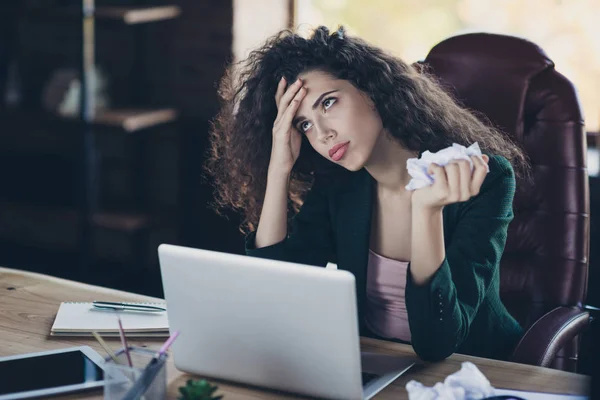 Close up photo disappointed entrepreneur  touch head tiredness have hardwork difficult question overwhelmed busy annoyed crumple paper sit table modern technology interior wear modern jacket — Stock Photo, Image