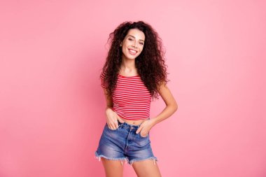 Closeup photo portrait of attractive pretty glad optimistic wearing mini shorts she her lady isolated pastel background clipart
