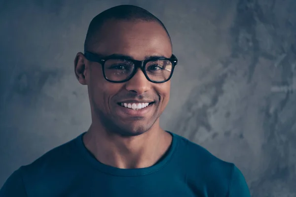 Close up photo amazing he him his dark skin macho smart eyes white perfect teeth reliable person diligent student graduated university college wear specs casual blue t-shirt isolated grey background