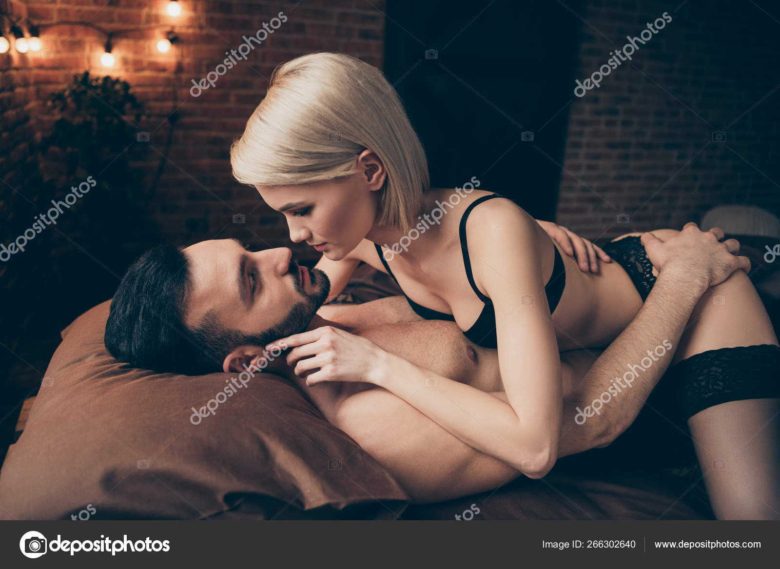 Close up side profile photo two partners people having sex kiss look eyes she her lady
