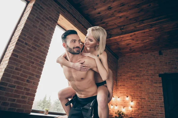 Close up photo two people playful in love role play pair partners she her lady he him his handsome were distant long time piggy back carry do not want to be separate again home house room indoors — Stock Photo, Image
