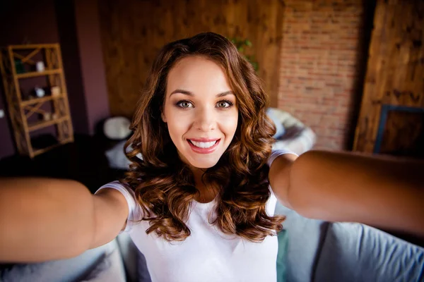 Self-portrait of nice-looking attractive lovely lovable shine perfect charming cute well-groomed cheerful cheery wavy-haired lady at industrial loft wooden brick style interior room indoors — Stock Photo, Image