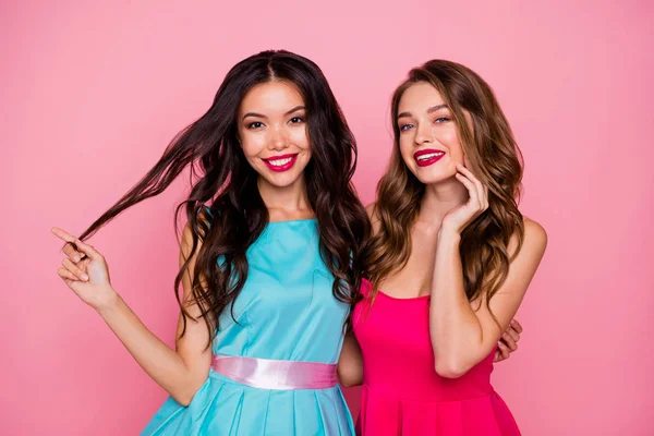 Close up photo two beautiful she her ladies graduation classy hugging playful coquettish adorable wear pretty nice cute shiny colorful dresses formal-wear isolated pink rose vivid background — Stock Photo, Image