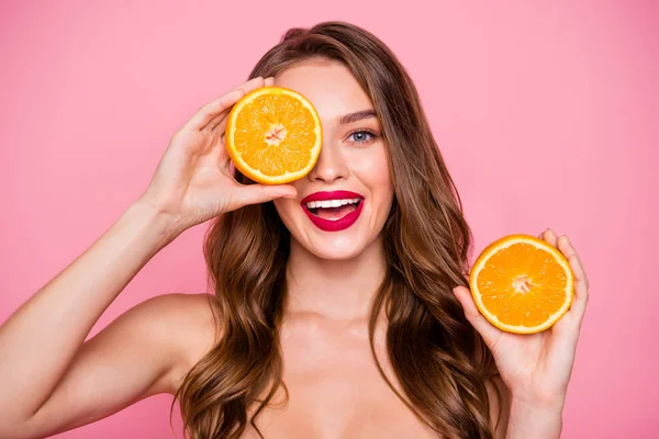 Close up photo beautiful amazing she her lady arms two orange slices hide one eye perfect allure lips natural body care useful influence wear no clothes naked nude isolated pink bright background — Stock Photo, Image