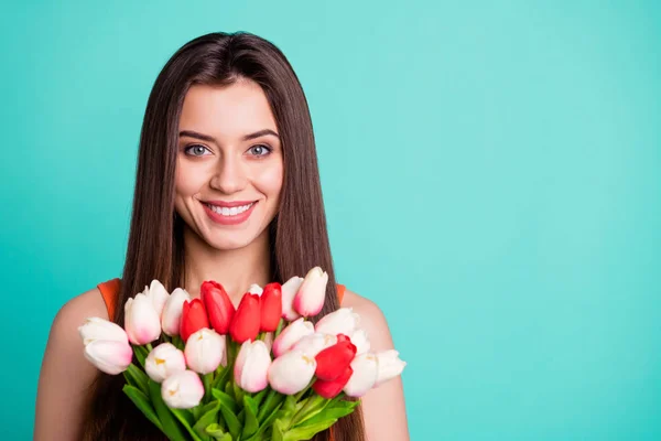 Close up photo beautiful amazing her she lady hands fresh flowers white red tulips surprise holiday anniversary party wife wear casual orange tank-top isolated bright teal turquoise background — стоковое фото