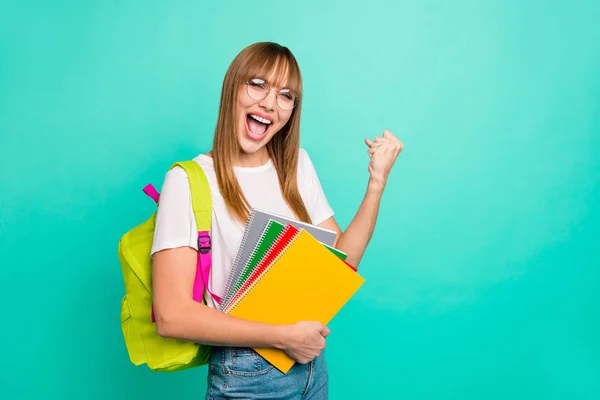 Close up photo beautiful she her lady yelling bast test results arms hands school colored notebooks staff modern backpack wear specs casual white t-shirt isolated teal green background — Stock Photo, Image
