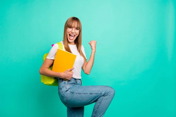 Close up side profile photo beautiful she her lady screelling bast test results arms hands school colored notebooks staff modern backpack wear specs casual white t-shirt isolated teal green background — Fotografia de Stock