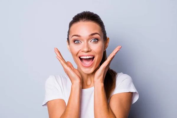 Close up photo beautiful amazing pretty yelling loud she her lady perfect appearance arms raised cheeks cheekbones open mouth not believe eyes wear casual white t-shirt isolated grey background — Stock Photo, Image