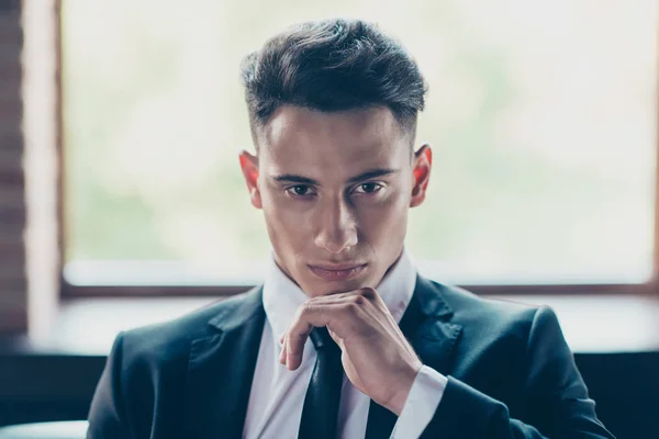 Close up photo perfect look handsome he him his thoughtful hand arm chin not smiling best boss attentive self-confident wear formal-wear shirt jacket tie suit costume indoors modern office place — Stock Photo, Image