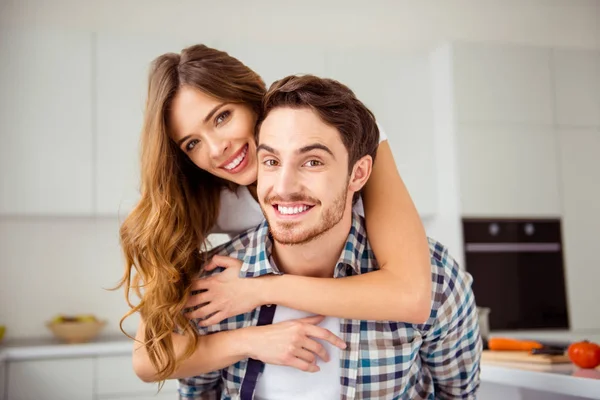 Portrait of happy cute couple in love hugs and smiling Stock Photo by ©deagreez1  119088898