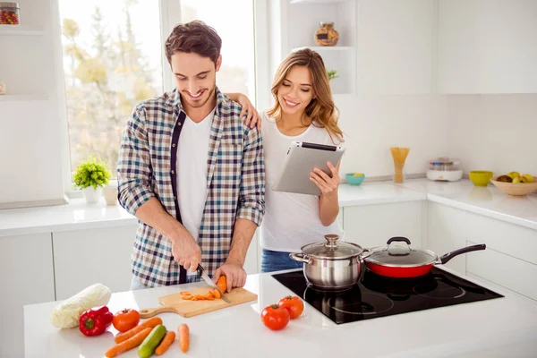 Close up photo pair beautiful he him his macho she her lady e-book e-reader electronic cook book overjoyed making first vegan breakfast dishes bonding apartments flat bright kitchen room indoors — Stock Photo, Image