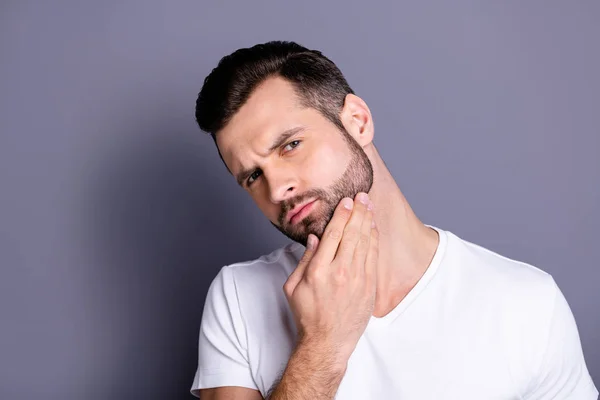 Close up photo amazing he him his macho perfect appearance touch arm hand bristle not sure quality stylist visit not smiling look mirror bath shower wear casual white t-shirt isolated grey background — Stockfoto